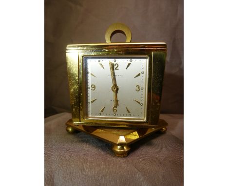 Tiffany and Co Brass eight day Desk clock on Rotating Art Deco base with circular handle. Four Faces - Barometer, Thermometer