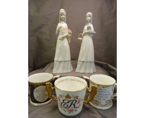 Pair of Lladro style figures of ladies, Two Royal Crown Derby - two handled cups commissioned by Govier's of Sidmouth and a R