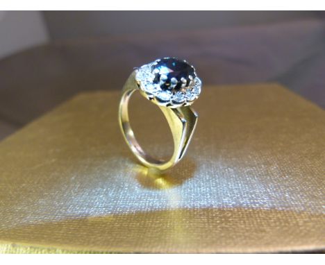 18ct Gold sapphire and Diamond ring set with large centre sapphire. UK - J  Total Weight - 4.7g