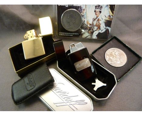 Tinned Davidoff lighter, Boxed Zippo lighter and two commemorative coins