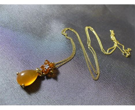 9ct Gold five Fire Opal and small Diamond Flower head pendant, with a Cabachon tear drop shaped Fire Opal Drop approx 9.6mm x