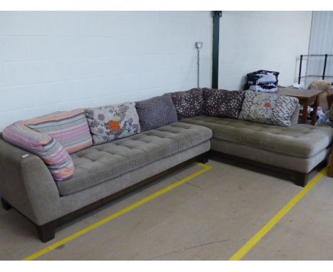 RocheBubois corner sofa with patterned cushions and mushroom grey seats