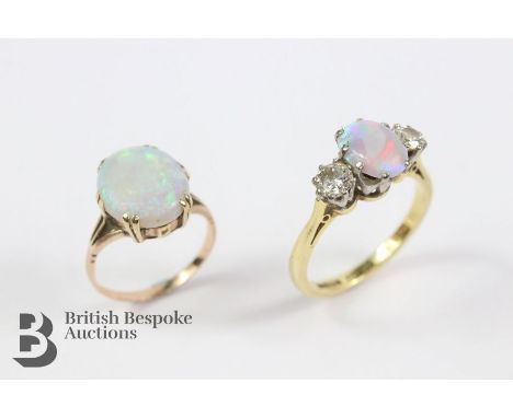 18ct hallmarked opal and diamond ring, the central opal measuring 8 x 6 mm set flanked by 40 pts of dias, size N, approx 3.79