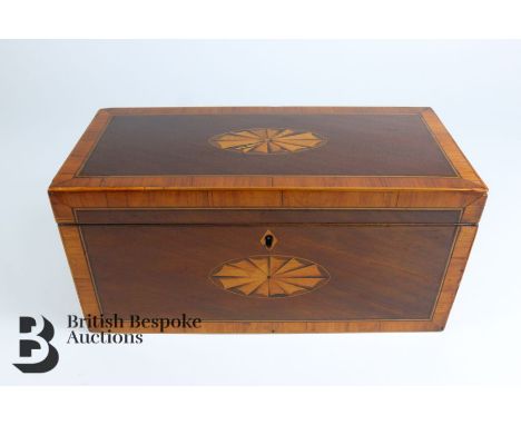 George IV mahogany and satinwood tea caddy, with decorative stringing and oval fan paterae inlay, approx 28 x 13 x 13.5 cms.&