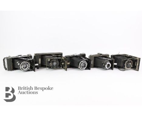 Vintage folding cameras, including an Carl Zeiss Ikon Compur Tessar 105mm 1:4.5 lens, Houghton &amp; Butcher Carbine Compur c