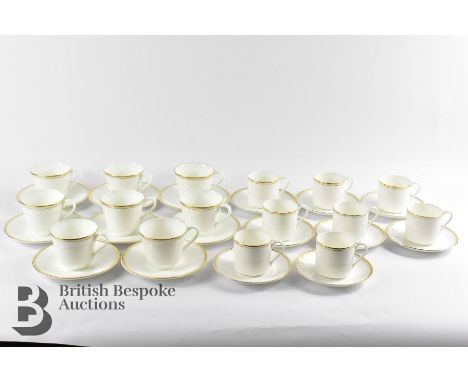 A large Royal Doulton Gold Concorde dinner service , comprising a tea pot h17cm and a coffee pot h22cm, 8 tea cups and 8 coff