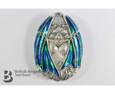 A silver plate and blue enamel vesta case, styled as a bat, approx 65 x 50 mm.&nbsp;