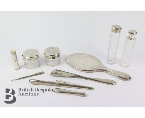 Silver and cut-glass vanity set, each piece having a engine-turned top London hallmark dated 1900/1901, comprising two long j