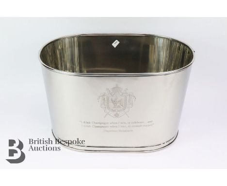 A large silver plated champagne ice bucket with inscription to the sides, approx 43 w x 26 h cms, inscription reads 'I drink 