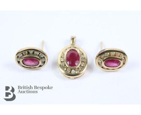 Pair of 9ct yellow gold ruby and diamond ear studs. The disc earrings set with rubies 5 x 3 mm, the pendant set with a ruby 6