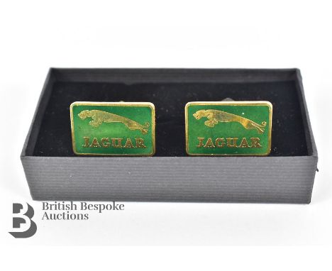 Pair of limited edition gold plated and British racing green enamel cufflinks, circa 1960/70s.

--