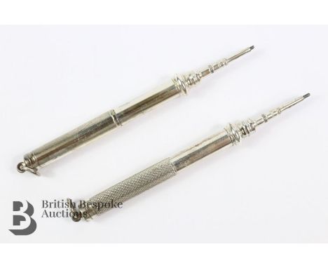 Two silver propelling pencils, Birmingham hallmark, stamped 925, having engine-turned decoration with suspension loops, appro