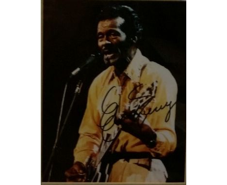 POP MUSIC, signed 8 x 10 colour photo of Chuck Berry playing guitar at microphone, overmounted, framed and glazed, EX