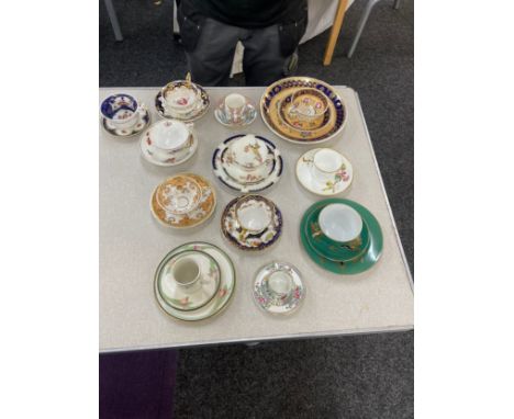 Selection of assorted cups and saucers and some trio sets includes Royal Doulton, Ainsley etc 
