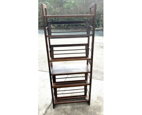 Vintage mahogany bookcase measures approx 60 inches tall by 23 wide and 10.5 deep