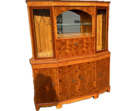 7 door yew wood drinks cabinet measures approx 68 inches tall, 58 inches wide, 15 inches deep