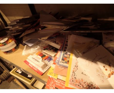 Shelf of mixed new greeting cards Christmas and other 