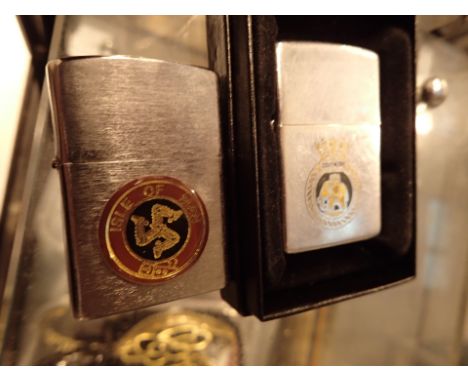 One boxed Zippo lighter and a Zippo style example