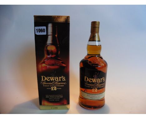 A bottle of Dewar's 12 yr old special reserve finest Scotch Whisky with box 1 litre 43%