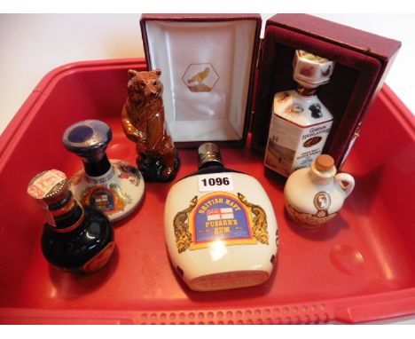 A small collection of ceramic decanters up to 20cl Gordan Highlander, Pusser's British Navy rum, Chivas, Beneagles bear & Bro