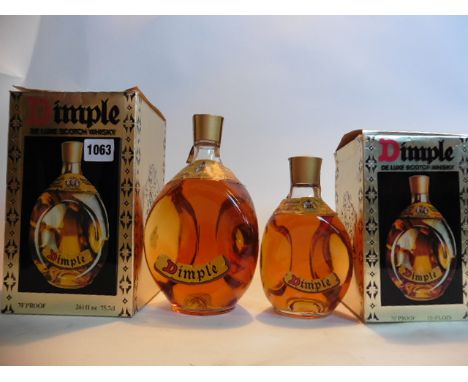 1 1/2 bottles of 1970's Haig Dimple de Luxe Scotch Whisky with boxes, 1x 26 2/3 floz & 1x 13 1/3 floz 70% proof
