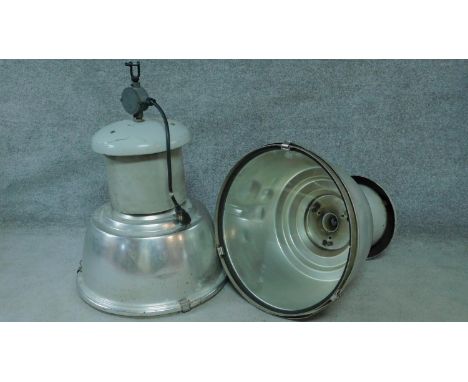 A pair of large vintage industrial spotlights in metal cases. H.80 W.60cm 