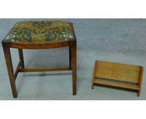 An oak Arts and Crafts book trough, signed by R. G. Collins to the bottom and an oak stool in William Morris fabric. H.45 W.4