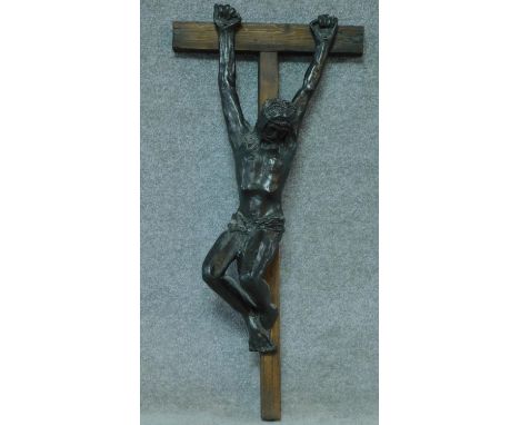 A vintage fibre glass Jesus mounted on a wooden cross. Intricately detailed. H.102cm 