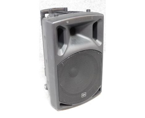 A portable speaker from QTX, model QX12PA fitted with trolley wheels and handle. H.55cm 