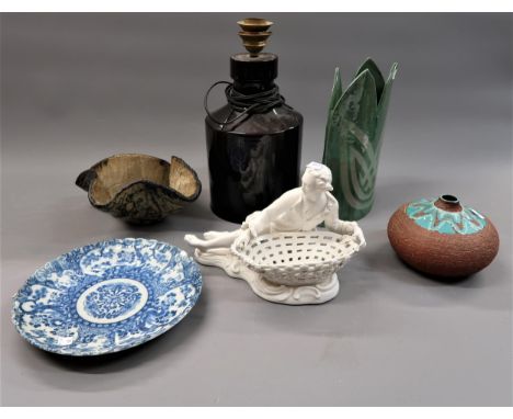 Continental porcelain figure of a reclining man with a basket, 10ins wide (at fault), together with an Imari blue and white p