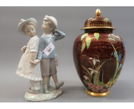 Lladro group of two children, Carltonware jar and cover decorated with stylised flowers on a red lustre ground (repair to rim