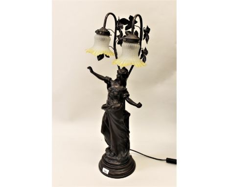 20th Century bronzed Classical style figural table lamp of a young lady, with arms aloft, with twin clear and yellow frosted 