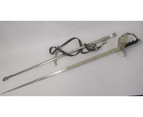 Italian military dress sword in a silvered scabbard, the blade marked ' Unione Militare Roma E. and F. Morster, Solingen ', 4