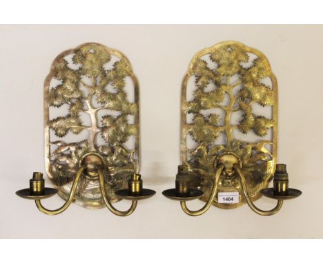 Alfred Bucknell / Ernest Gimson, pair of fine Cotswold school brass twin light wall sconces of shaped lozenge design, the pie