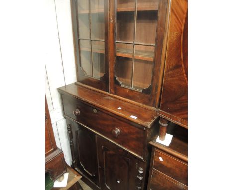 19th Century mahogany secretaire bookcase, the moulded cornice above a pair of bar glazed doors, the base with a fitted drawe