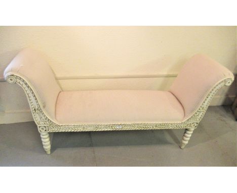 Reproduction painted window seat in Regency style, upholstered in a cream stripe fabric, on bobbin turned supports, 5ft wide 