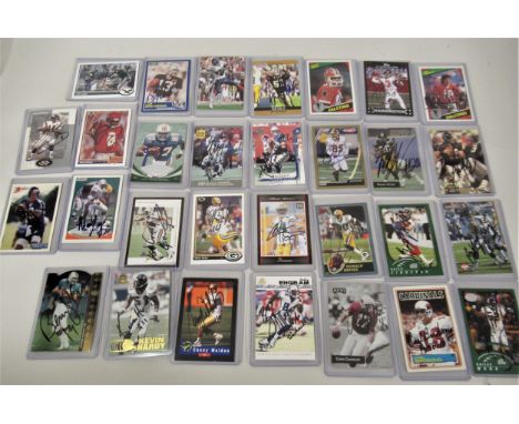 Collection of thirty American football  cards in sleeves, signed 