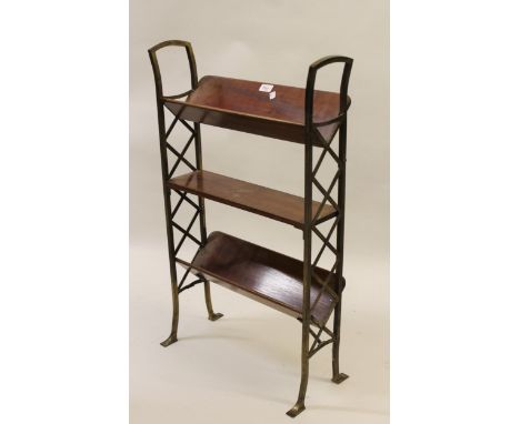 Early 20th Century gilt brass and mahogany three shelf bookrack of Arts and Crafts design, 34ins x 21ins 