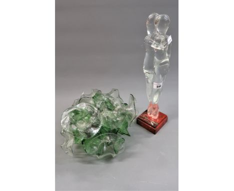 20th Century crystal sculpture of two embracing figures on a marble plinth, 15ins high, together with a glass and metal flora