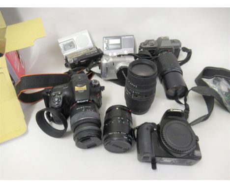 Canon EOS400D digital SLR camera body, Sony digital SLR camera, Pentax P30 35mm film camera, together with other miscellaneou
