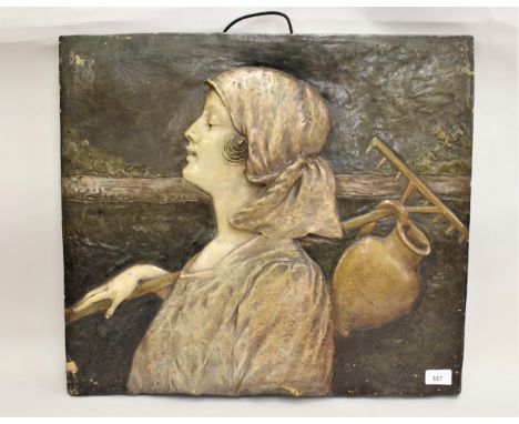 Late 19th Century Austrian painted terracotta plaque relief decorated with a portrait of a Dutch girl carrying a rake and pit