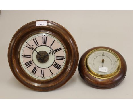 19th Century Continental circular wall clock, the glass dial with Roman numerals, together with a circular oak aneroid barome