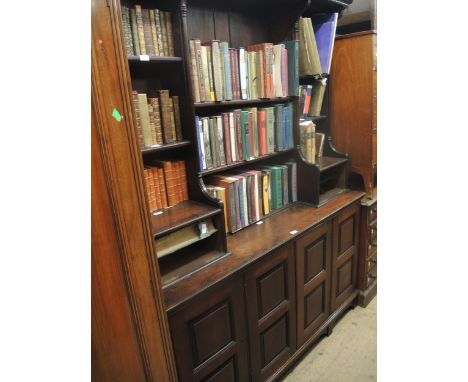 Mahogany dresser / side cabinet, the moulded dentil cornice above a boarded back with open shelves and cupboards, the base wi