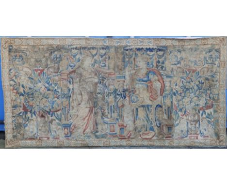 A 17thC tapestry panel depicting figures between columns with profuse foliage, children and monkeys,  33" x 64" - re-mounted.