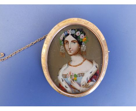 A 19thC oval gold brooch set with a painted miniature portrait of a young woman in ermine stole, 2" - broken glass to verso.