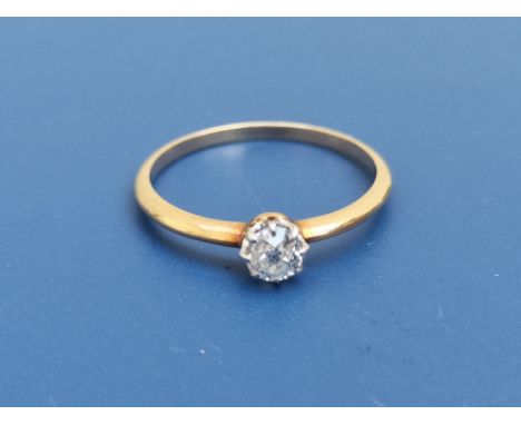 A small old cut diamond solitaire diamond ring, weighing approximately 0.25 carat on yellow metal shank.  Finger size L/M.