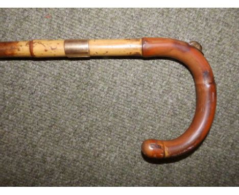 A Brigg walking stick with 12ct gold mounts initialled 'CHBP', London hallmarks for 1930, 37".