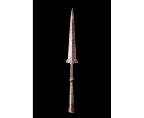 Ca. 1100-1400 AD.An iron spearhead, notable for its distinct features that illustrate the functional design and craftsmanship