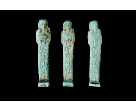 Late Period, 30th Dynasty, Ca. 332 BC.A group of three light blue faience ushabti figures, each exuding an air of serenity an