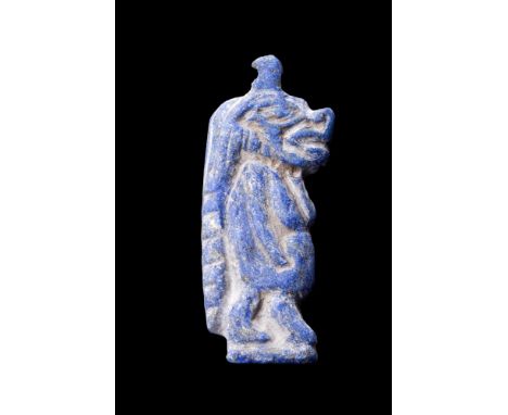 Ca. 1550-1069 BC.An amulet of the goddess Taweret made from expensive lapis lazuli. She is depicted as a hippopotamus, with b